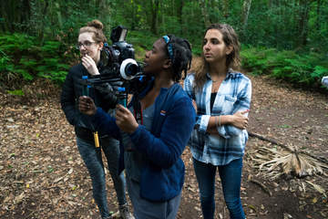 Seaver students filming in the woods