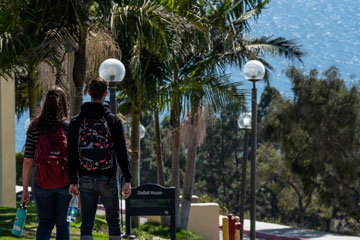 Students walking down Seaver's Malibu campus