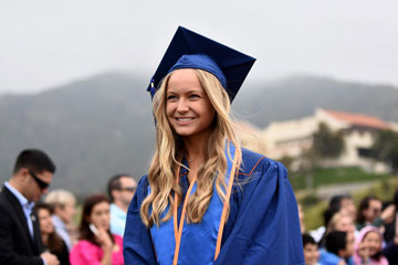 Katie White pictured in her graduation gown and robe