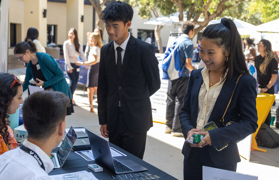 Students at a table during the career fair