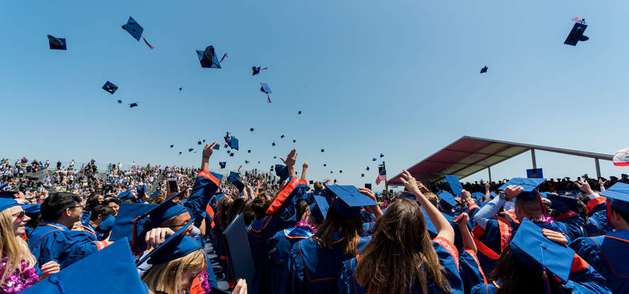 Seaver class of 2018 tossing their graduation caps