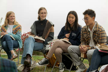 Seaver students seated for an outdoor class