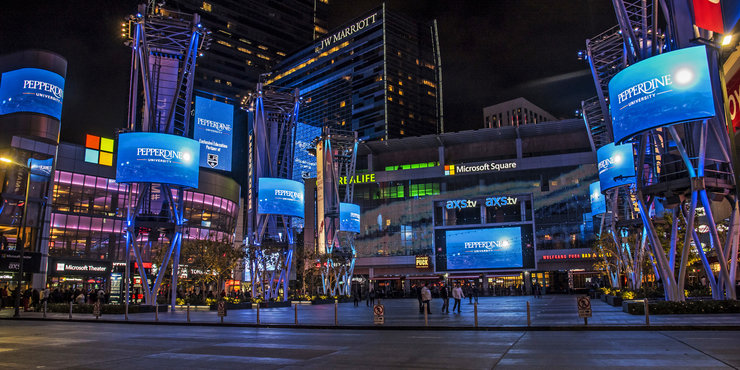 LA Live at night with Pepperdine branding  on the jumbo screens