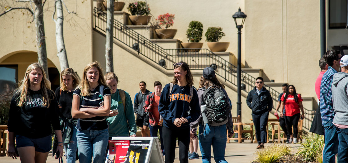 Seaver students walking in the Mullin Square