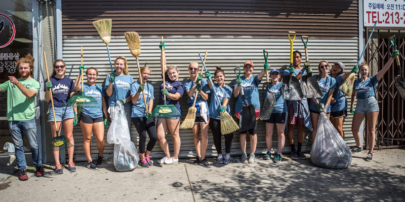 Seaver students pictured with shovels and rakes
