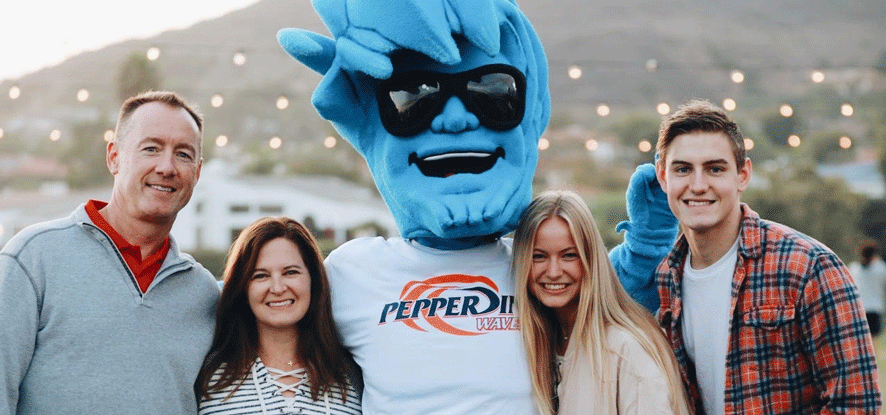 Katie White and family pictured alongside Willie the Wave