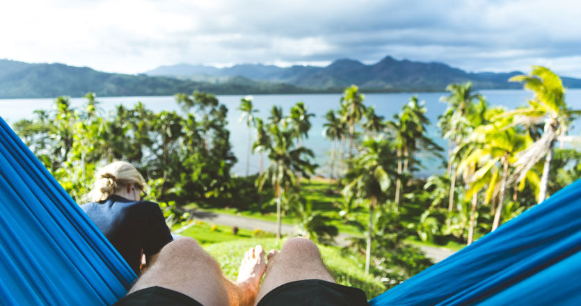 Student on a hammock overlooking the view in Fiji