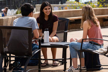 Students seated outside Mullin Town Square