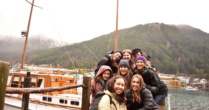 Students studying on a dock in New Zealand