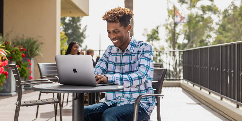 Student working on a laptop