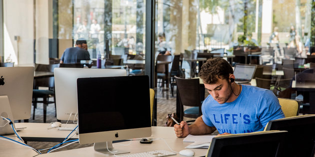 Seaver student studying in the library