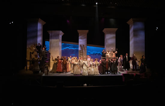 Students on stage performing Ragtime