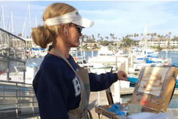 Shannon Cella painting on the harbor
