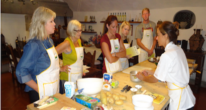 Seaver alumni receiving a cooking lesson in Florence, Italy