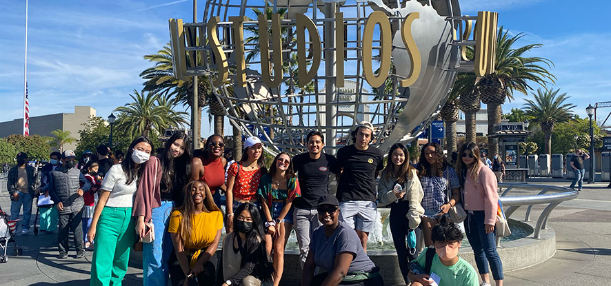 Students gathered in front of the Universal Studios globe