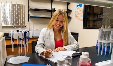 Madison Johnson working at research