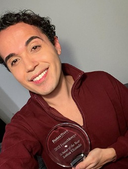 Joshua Elizondo with the Fostermorey Award