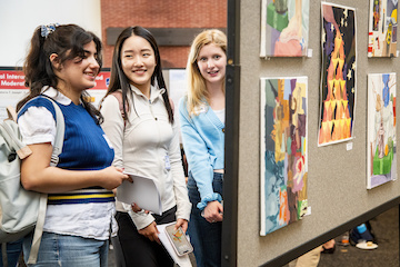 Students admire art