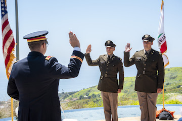 Two cadets take an oath of office