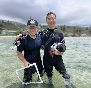 Kim and his student, Nick Yi, in pose in the ocean