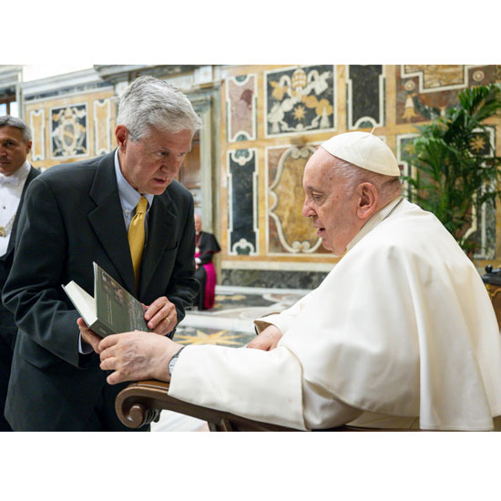 Paul Contino presents a book to Pope Francis