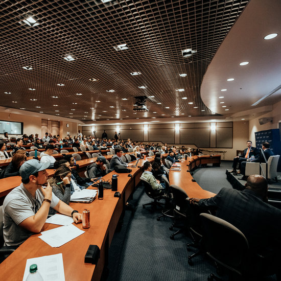 Students listening to a presentation