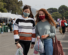 Victoria Levinsohn and Caroline King at the farmer's market