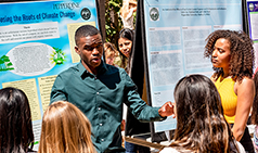 Student presents climate change research to peers