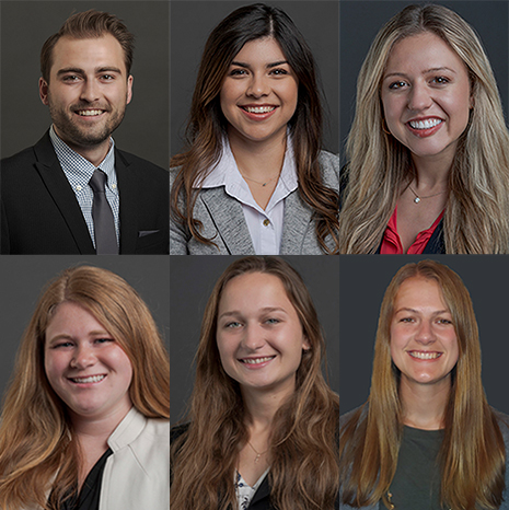 Six Fulbright scholars smile for professional portrait.