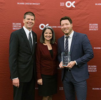 Ryan Groves accepts Young Alumnus Award from Oklahoma Christian University