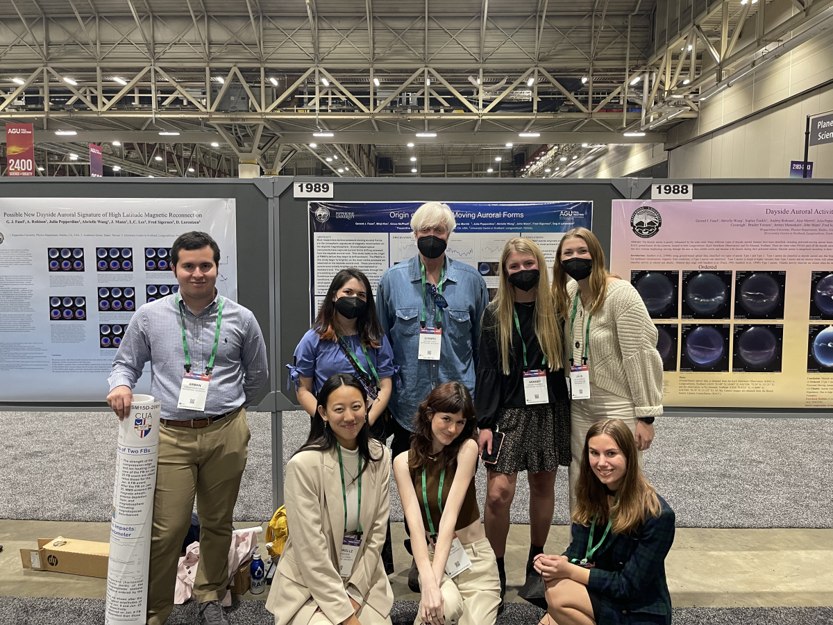 Students and Gerard Fasel in front of their posters