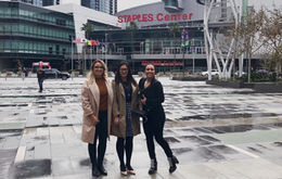 Student and job host in front of Staples Center