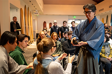Seaver student is given a cup of tea