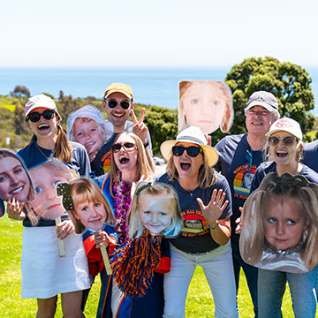 people holding baby pic fans